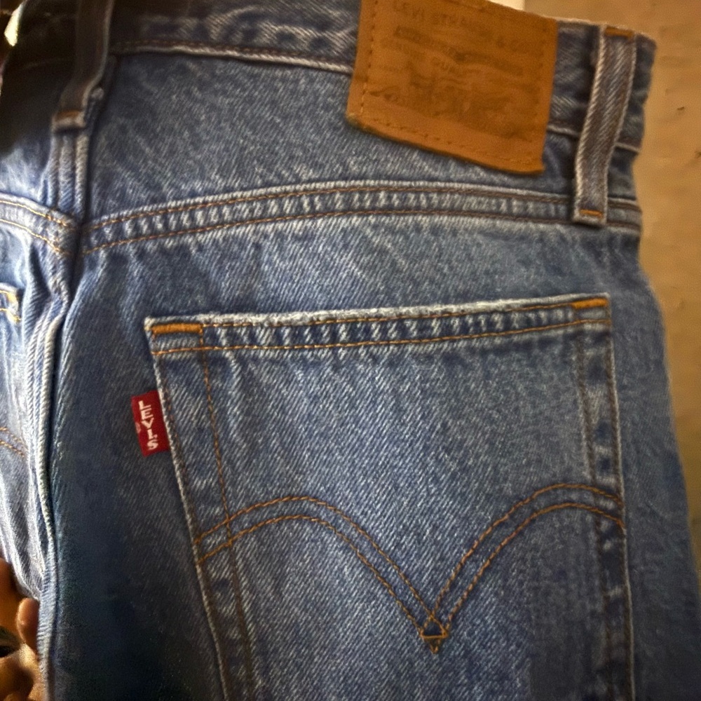 Levi's Women's Straight Jeans in Blue with Brown Patch and Red Tab